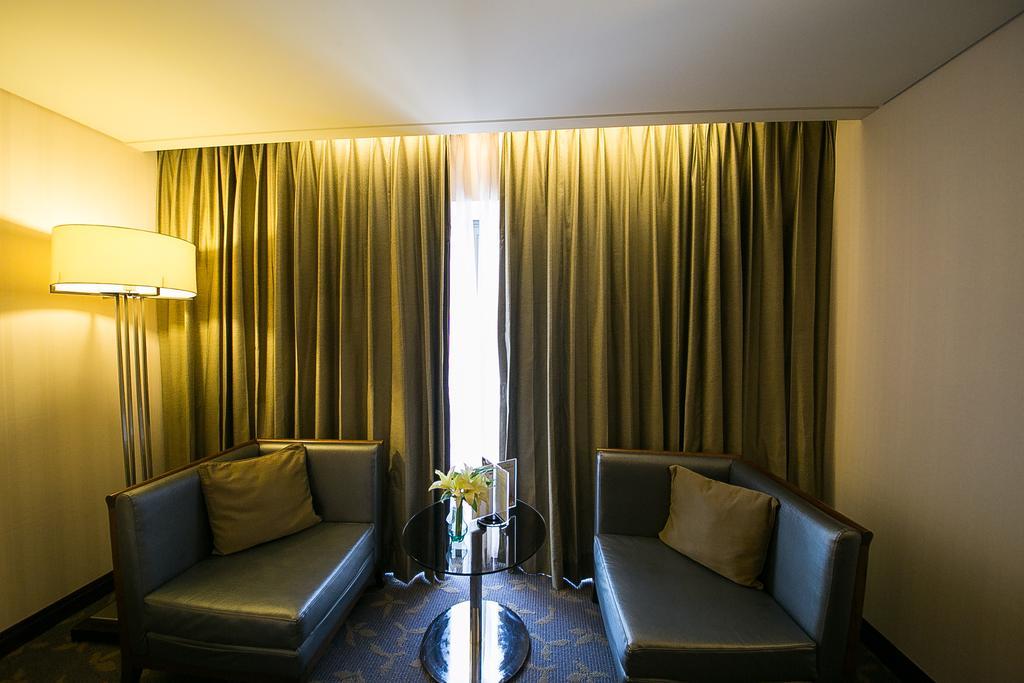 Evergreen Plaza Hotel - Tainan Rum bild A room at the hotel