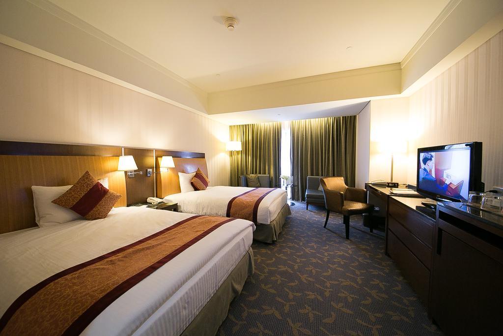 Evergreen Plaza Hotel - Tainan Rum bild Deluxe Room